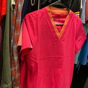 Double color collar figs scrub top size small never worn but tags were removed.